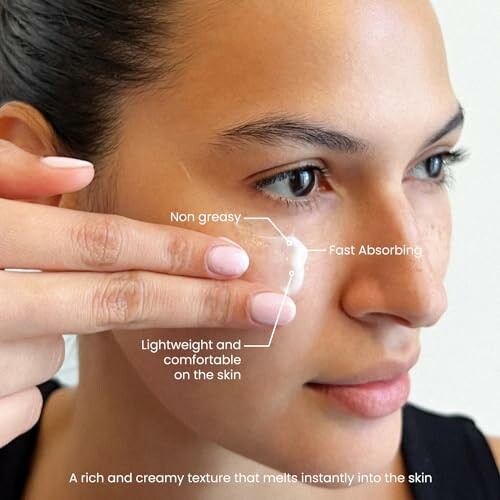 Woman applying skincare cream on her face with text overlay.